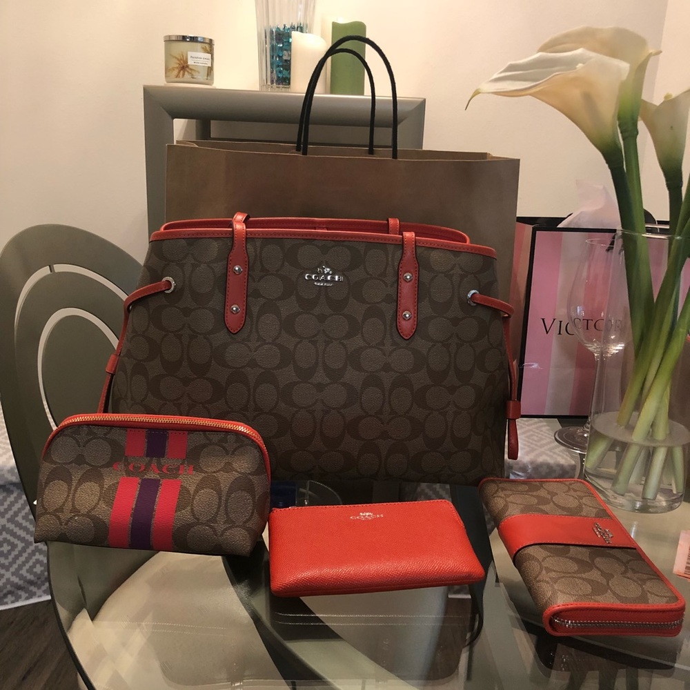 4 piece COACH Signature Canvas Set.